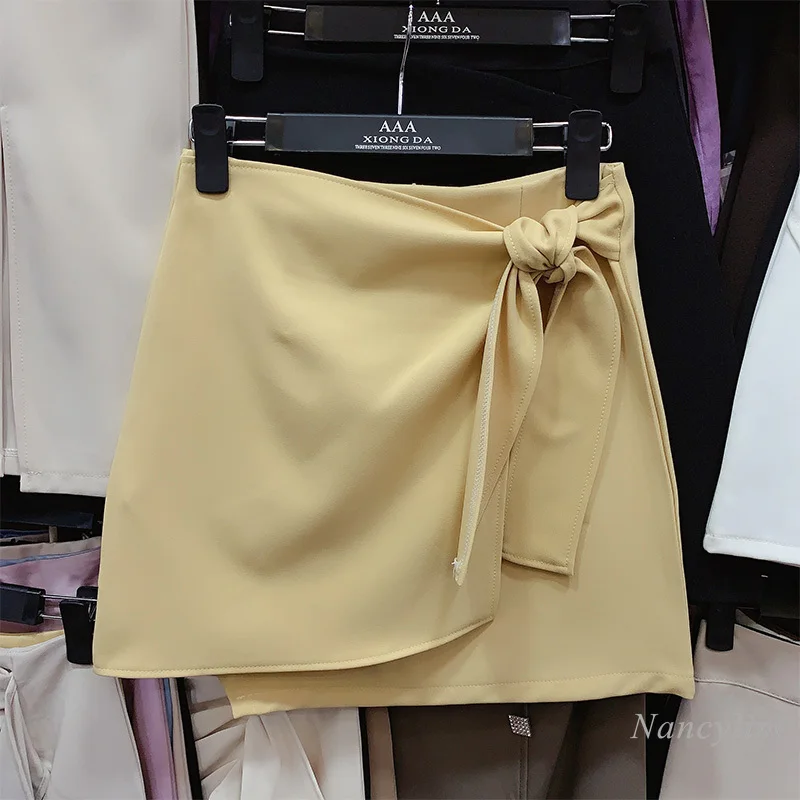 

bow tie waist skirts womans 2021 Spring New Elegant Slimming Asymmetric Lace-up High Waist Solid Color Ins fashion Skirt
