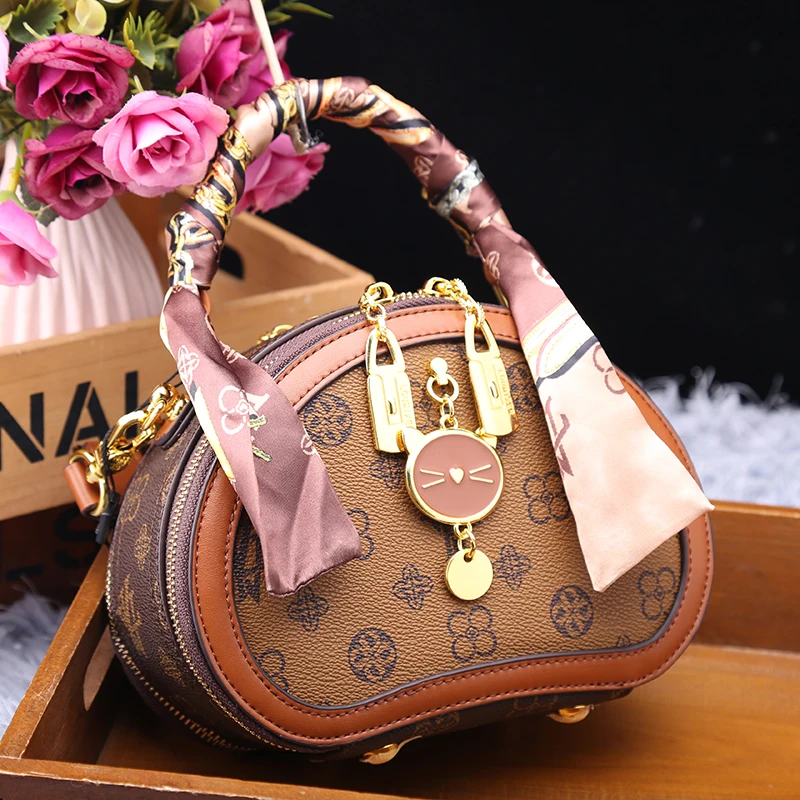 

Роскошная брендовая универсальная маленькая круглая сумка из 100% натуральной кожи в западном стиле для дальнозоркости Повседневная сумка-м...