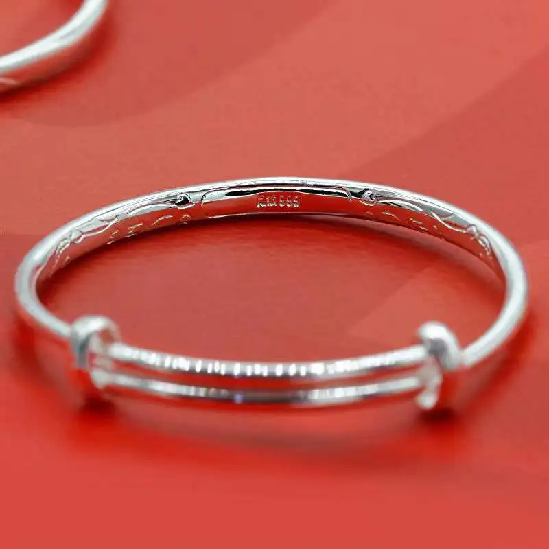 Браслет из серебра 9999 пробы с колокольчиком и надписью Благословение ребенка |