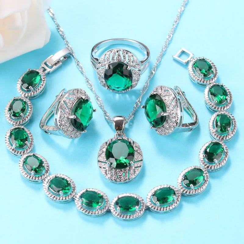 Женский ювелирный комплект Свадебный костюм из серебра 925 пробы с зеленым