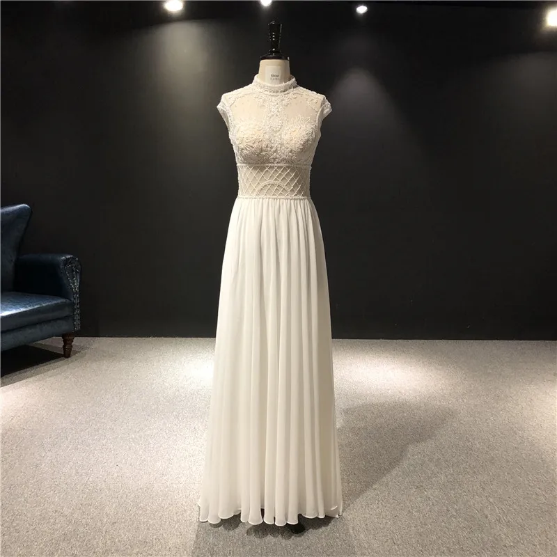 

Real Pictures Newest High Quality Customized Ivory Tulle V-neck Sleeveless Heavy Beadings A-line Floor Length Wedding Dresses