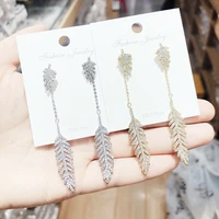 wholesale fashion graceful and fashionable detachable feather dream catcher earrings long tassel hollow jewelry
