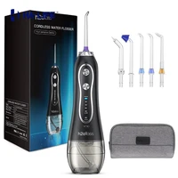 portable dental cleaner with 5 different stamping heads for all round cleaning oral hygiene health and environmental protection