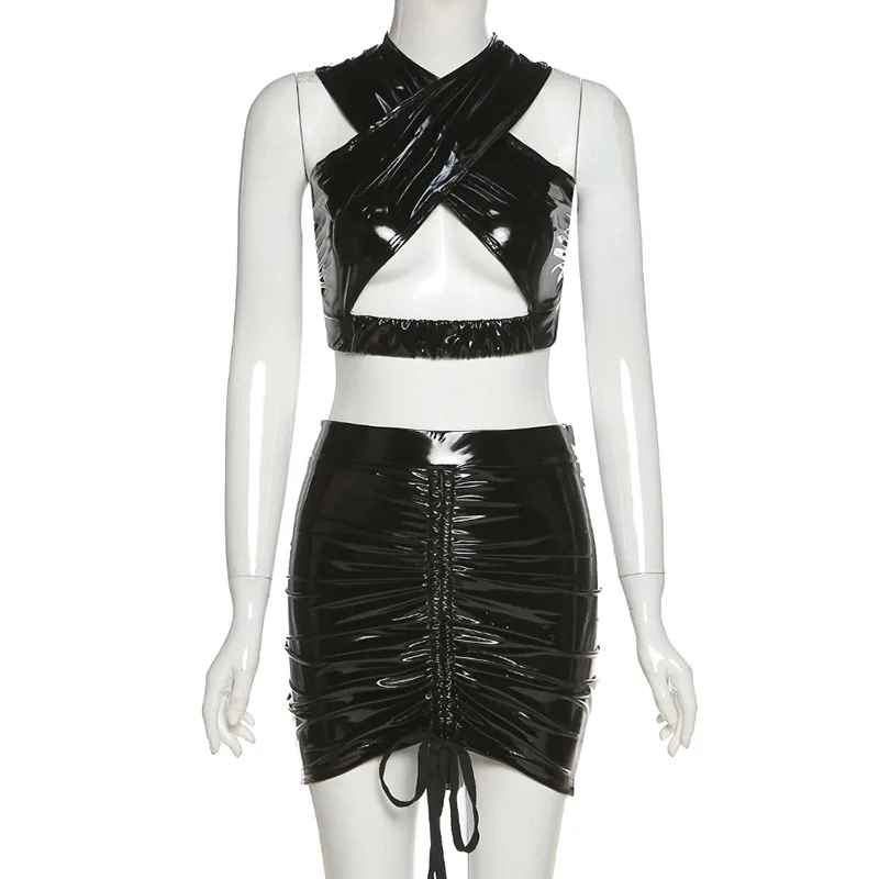 

Europe and the United States cross border 2021 spring women's new hanging neck open back hollow vest pleated short skirt