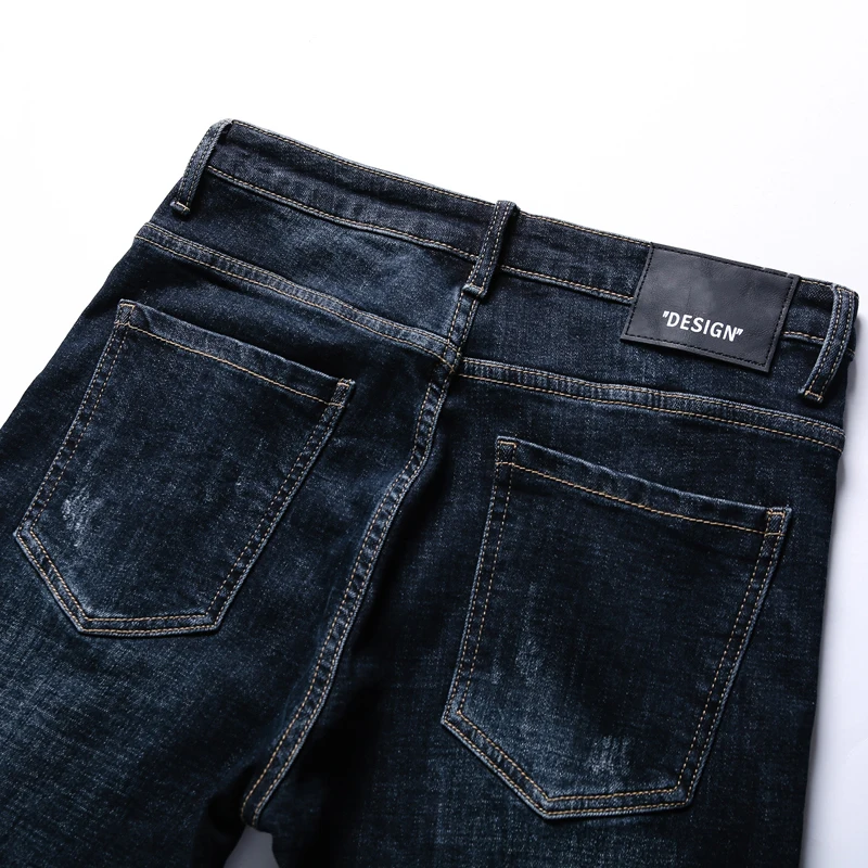 KSTUN зимние мужские джинсы плотный материал темно синие стрейч облегающие с