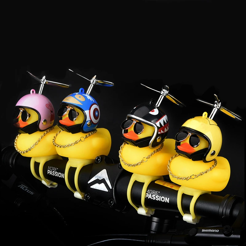 

Luminous Standing Duck with Helmet Silver Airscrew Broken Wind Small Yellow Duck Road Bike Motor Helmet Car Interior Accessories