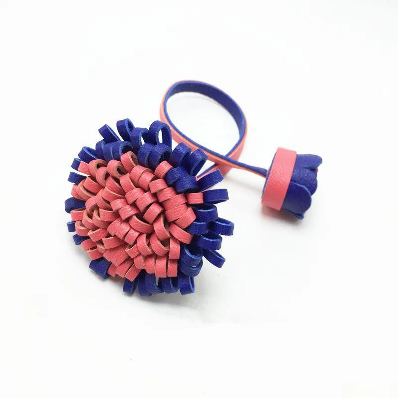 

Роскошный брелок из натуральной кожи с кисточкой, стильный и прочный Шарм для сумки для женщин, идеальный подарок для девушек и женщин