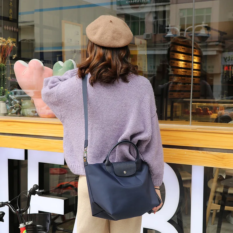 

Commuter thickened Longxiang bag large capacity messenger bag dumpling bag nylon portable shoulder bag Oxford cloth
