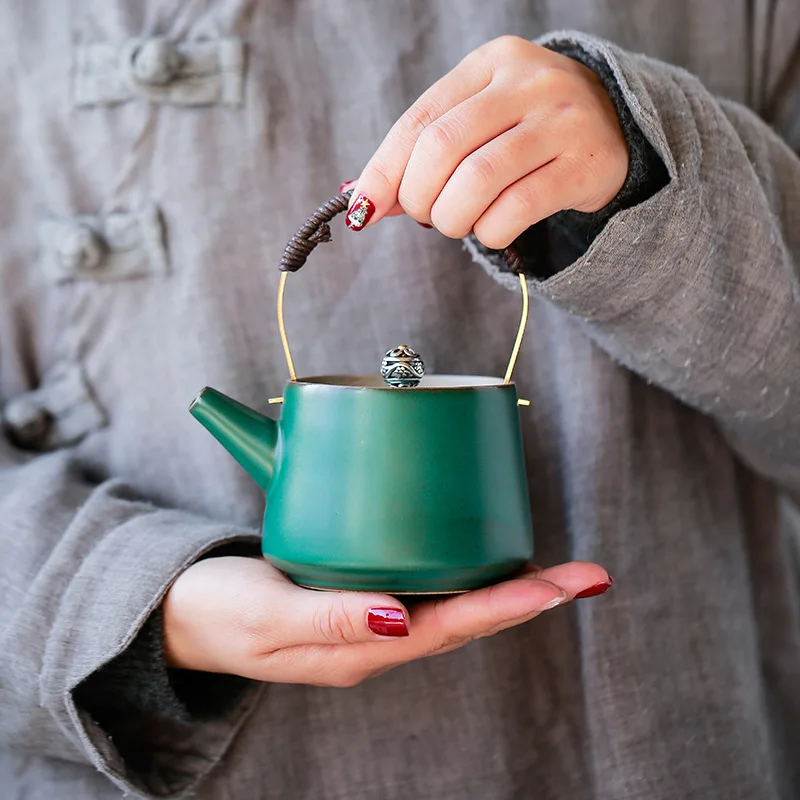 

Japanese-style stoneware lifting beam pot, hemp rope copper lifting beam, handmade retro kiln variable ceramic kung fu teapot