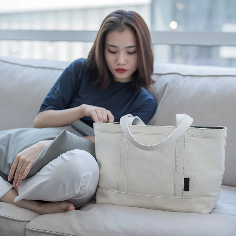 

Japanese Pure Single Shoulder Canvas Bag Hand-held Tote Cotton Original Environmental Protection Advanced Sense Commuting Bag