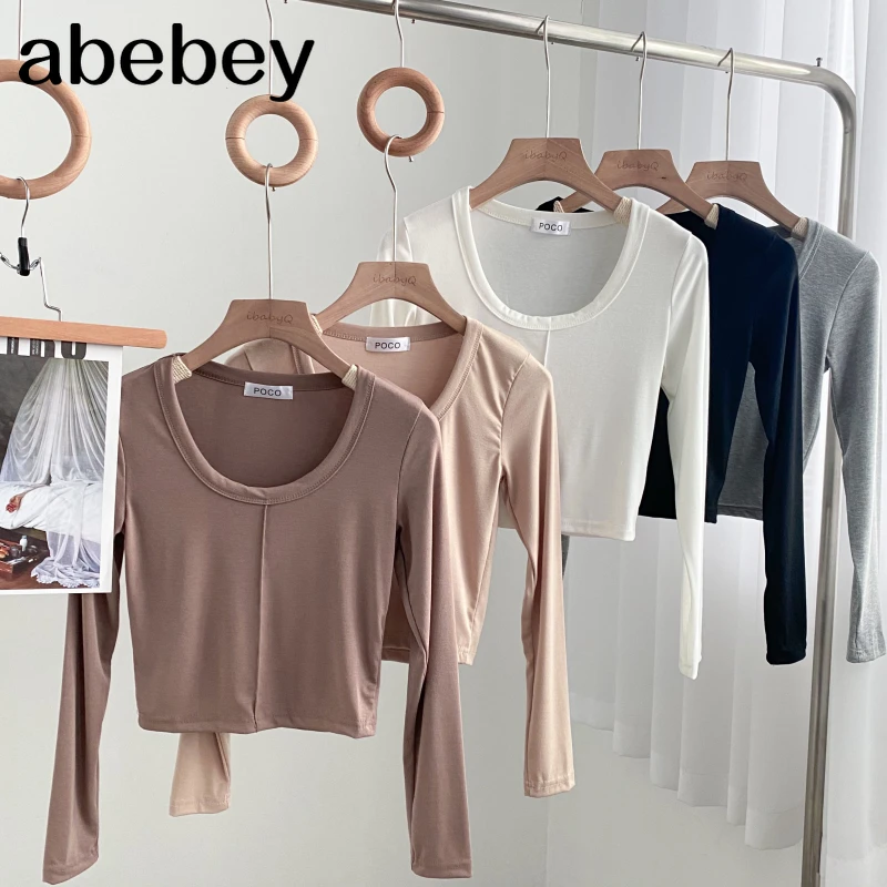 

Fashion versatile O-neck long sleeve T-Shirt high waist off navel solid color short bottomed T-Shirt Top 2022 New Spring Autumn
