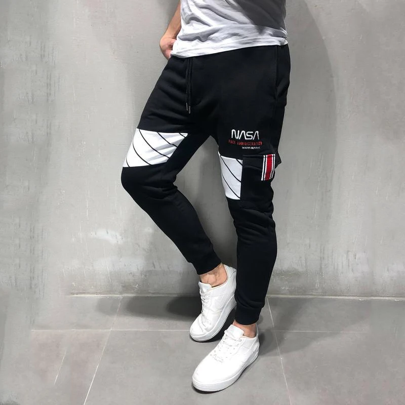 

Jogger sports pants men's muscle fitness splicing slim pants casual fashion trend