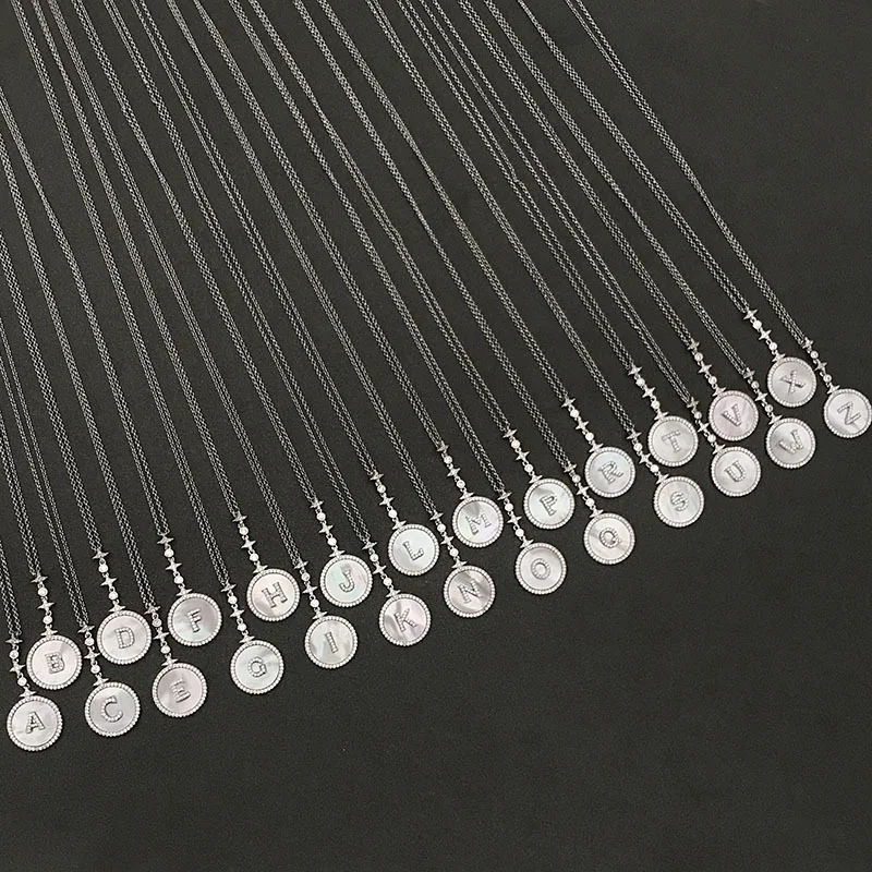 

S925 sterling silver summer new letter mother shell necklace female European and American fashion retractable sweater chain gift