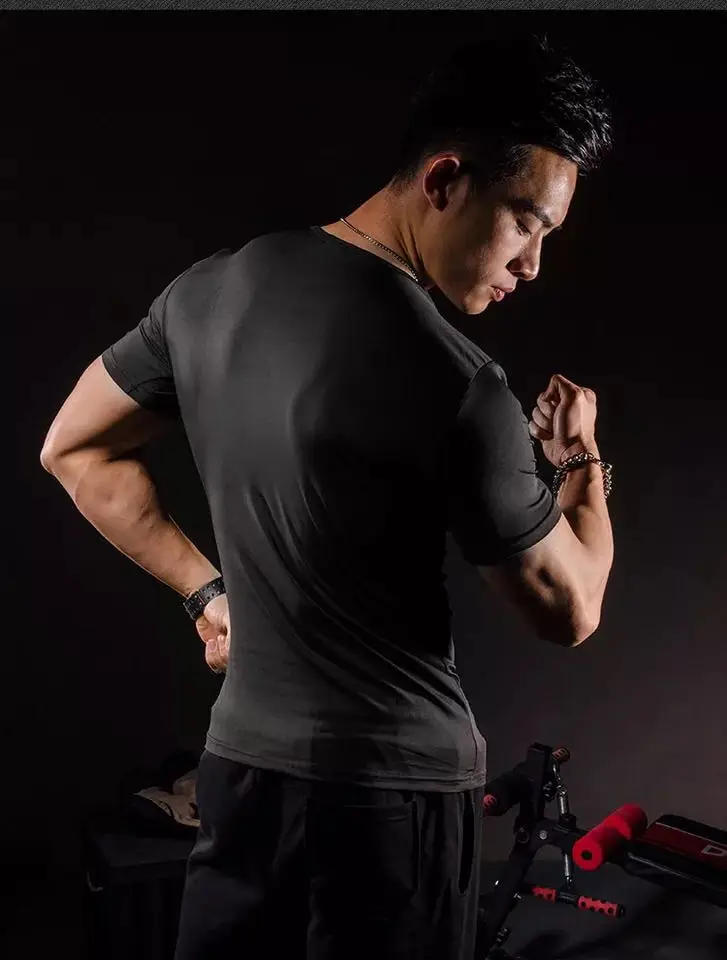

J1577-Workout fitness men Short sleeve t shirt men thermal muscle bodybuilding wear compression Elastic Slim exercise clothing