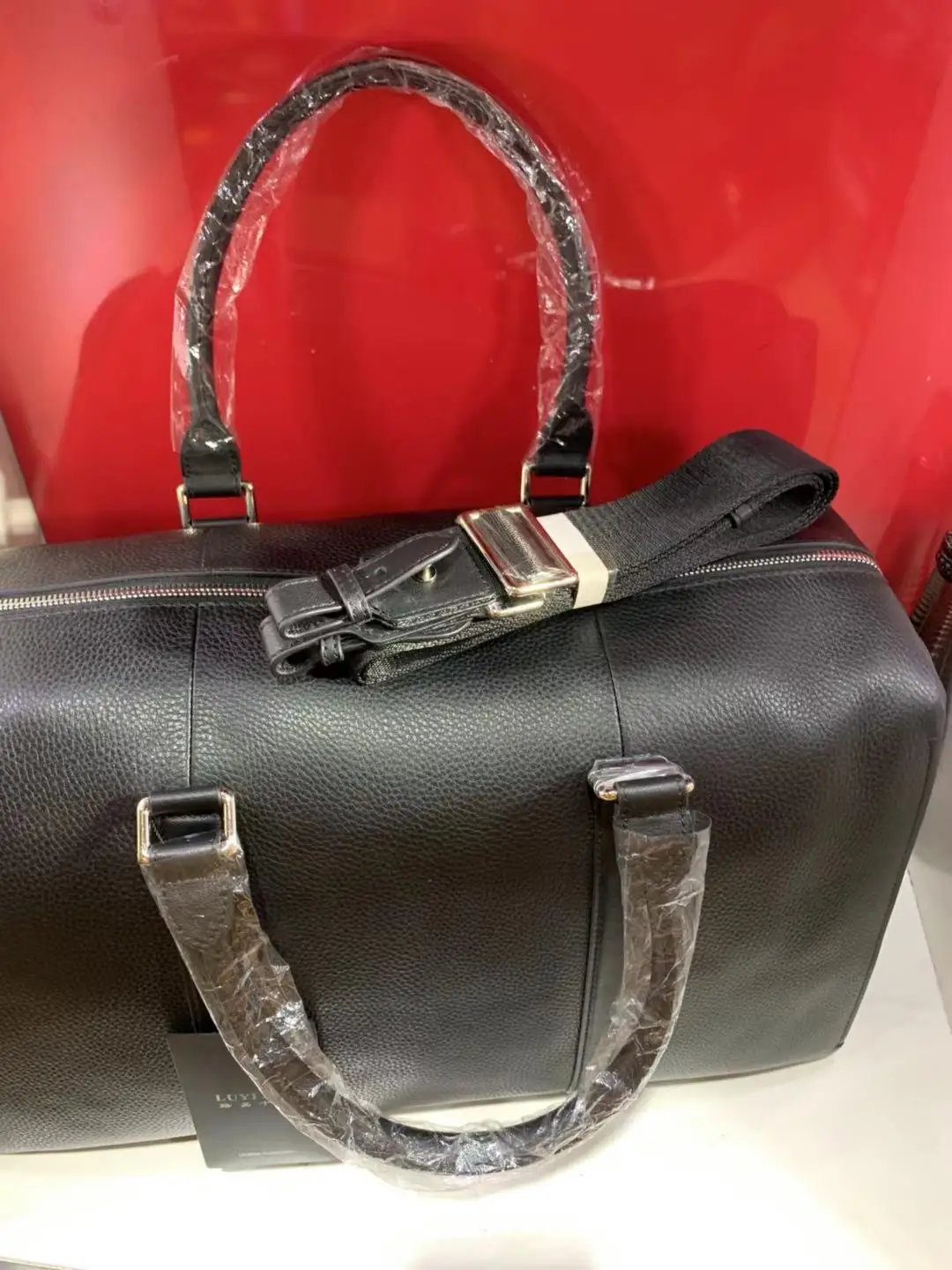 

Luxury brand men's leather zipper handbag high quality fashion new woven leather high quality large capacity office travel bag