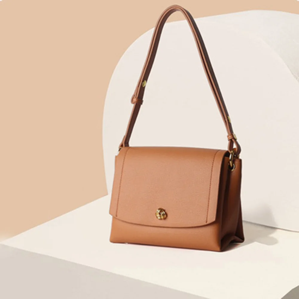 

Fashion simple leather handbags 2021 new style leather magnetic buckle shoulder messenger niche small square bag small bag