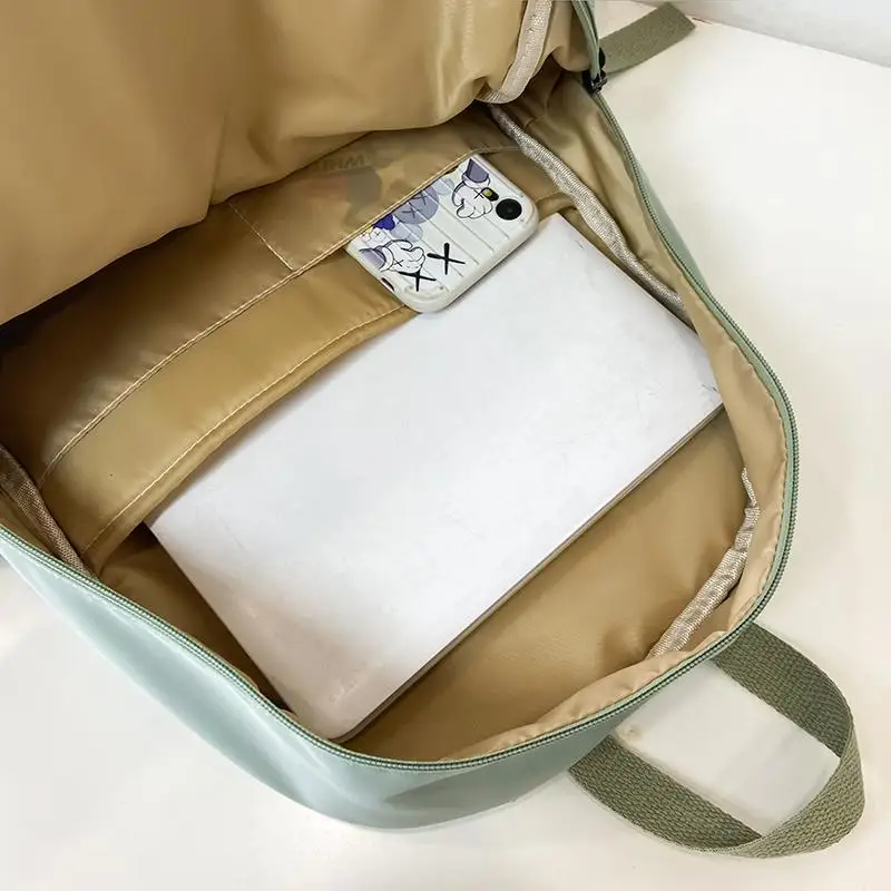 

Unisex Multi-pocket waterproof nylon Backpack High quality buckles Leisure travel backpack Korean School bag for senior students