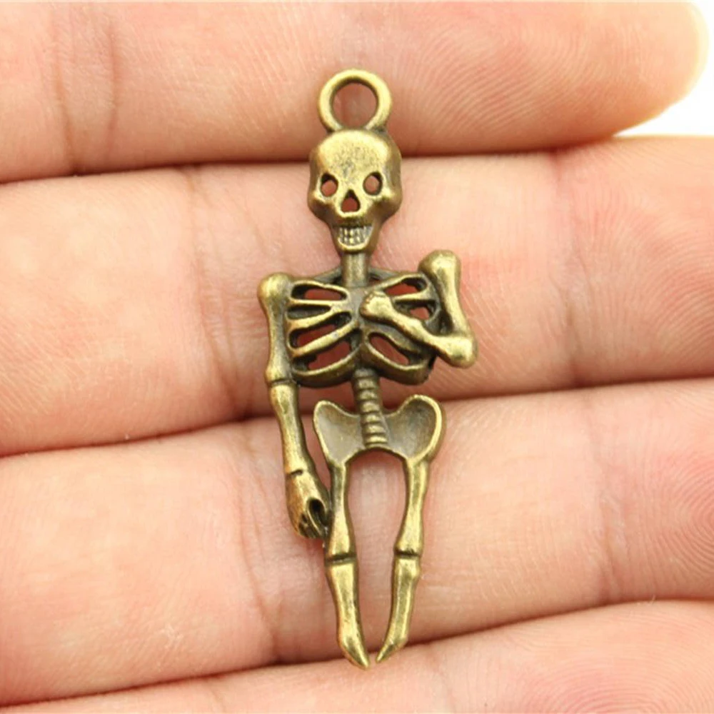 

50pcs 41x15mm 3 Colors Antique Gold Antique Silver Color Antique Bronze Skull Skeleton Charms Pendant For Jewelry Making