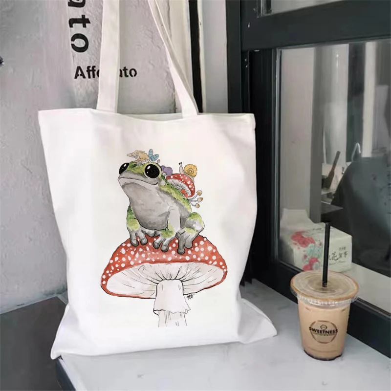 

Frog backpack large-capacity all-match messenger bag summer new cute fun canvas handbag fashion female bag wallet.