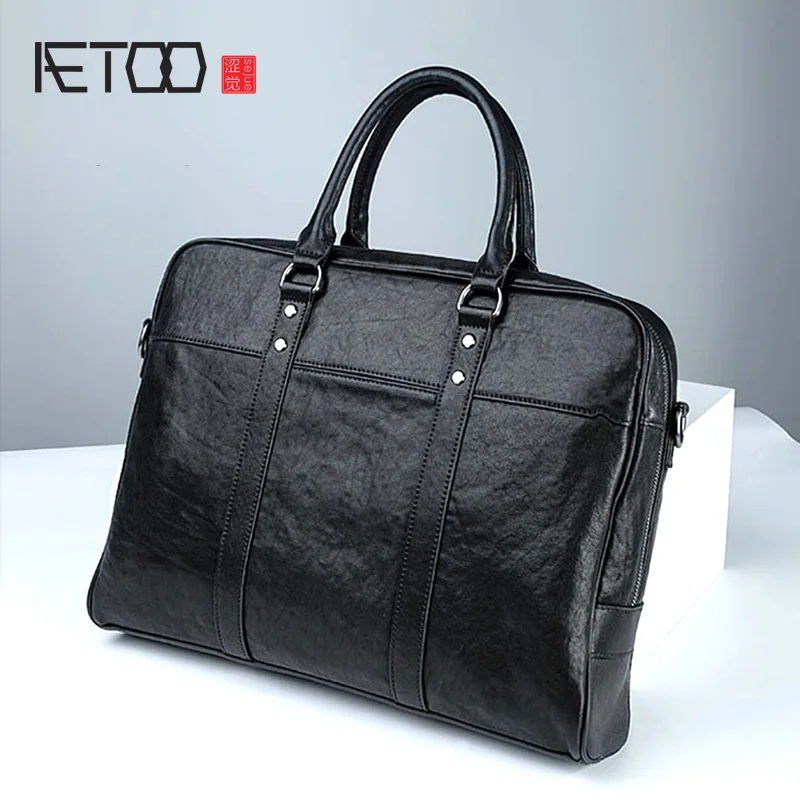 

AETOO Men's leather business briefcase, men's cross-sectional head leather handbag, trend one-shoulder slanted bag