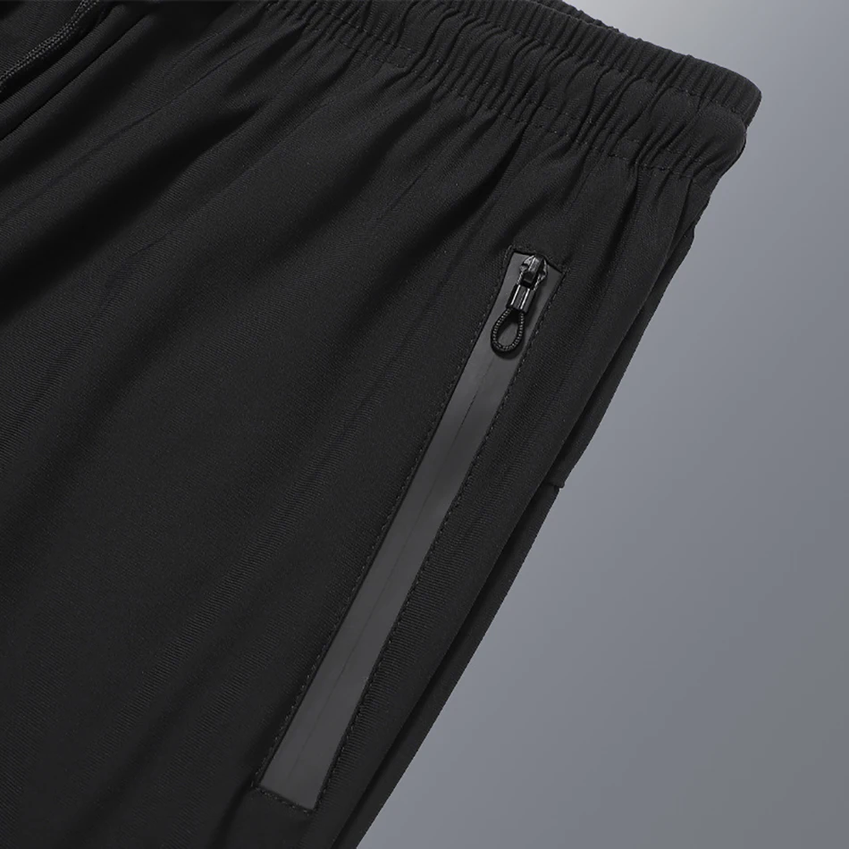 

Summer New men's Casual Ice Silk Shorts Black Solid Color Breathable Swimming Trunks Quick-Drying Gyms Sports Five-Point Pants