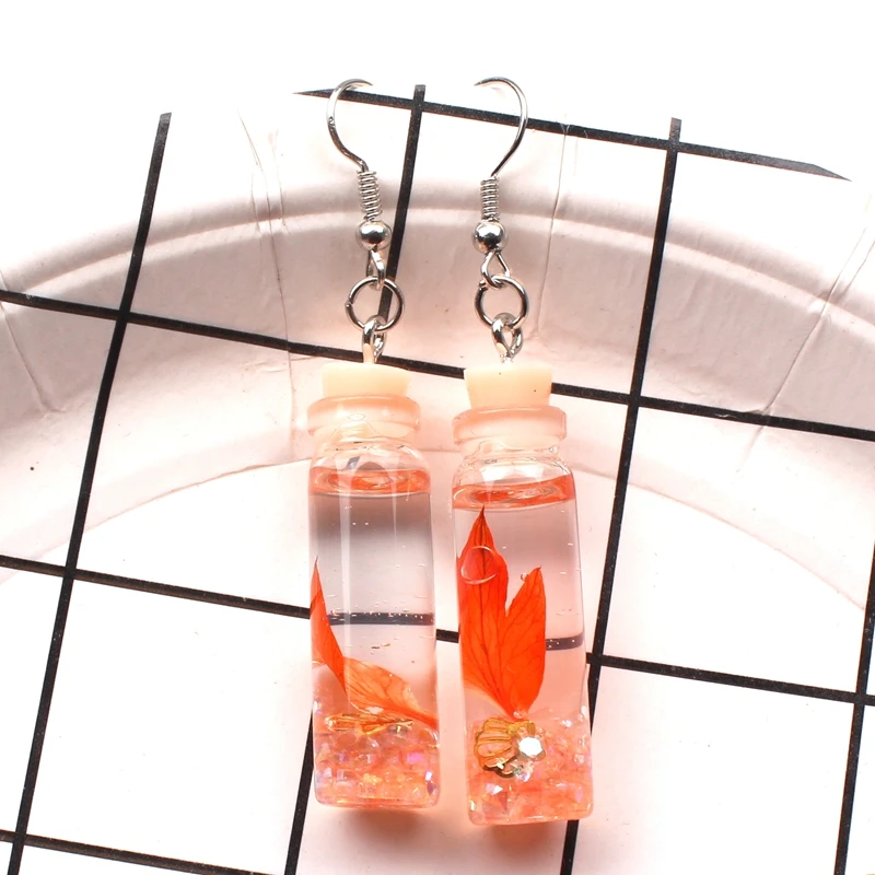 Женские круглые серьги прозрачные из закаленного стекла в виде листьев с