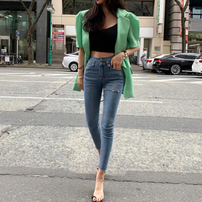 Женские рваные джинсы с высокой талией эластичные узкие бахромой на подоле