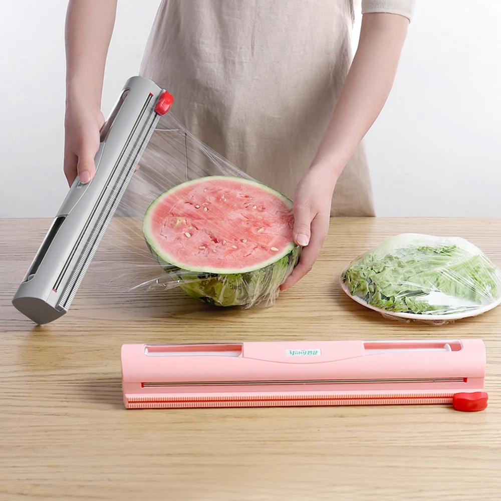 

Plastic Food Wrap Dispenser with Slide Cutter Adjustable Cling Film Cutter Preservation Foil Storage Box with Suction Bottom