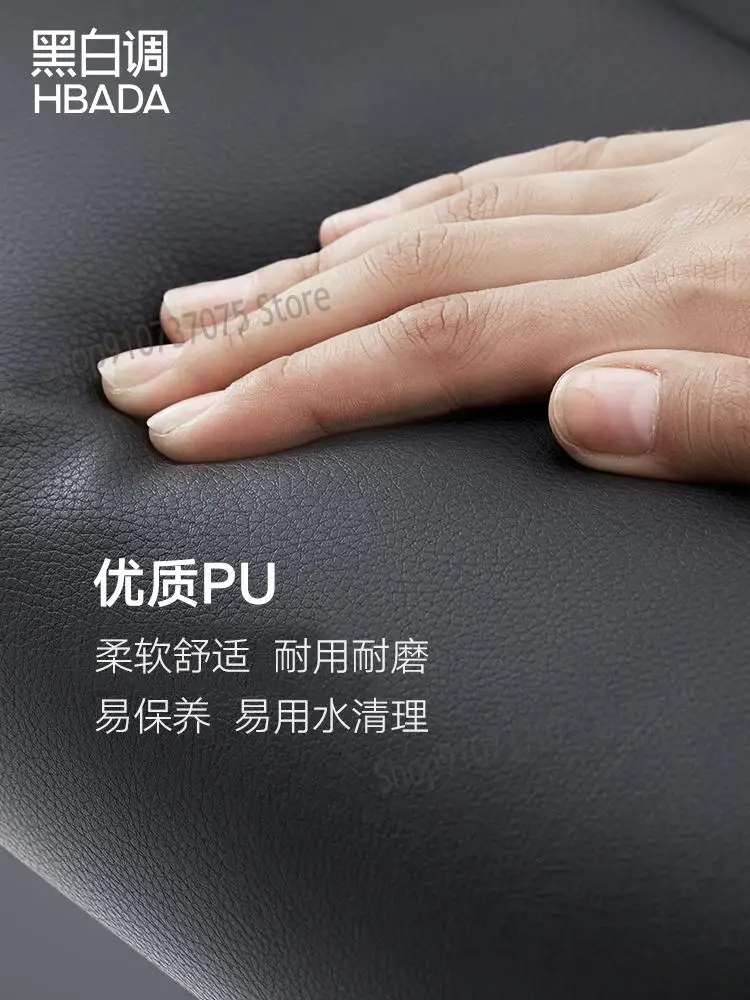 Черно-белое компьютерное кресло домашнее руководителя вращающееся с