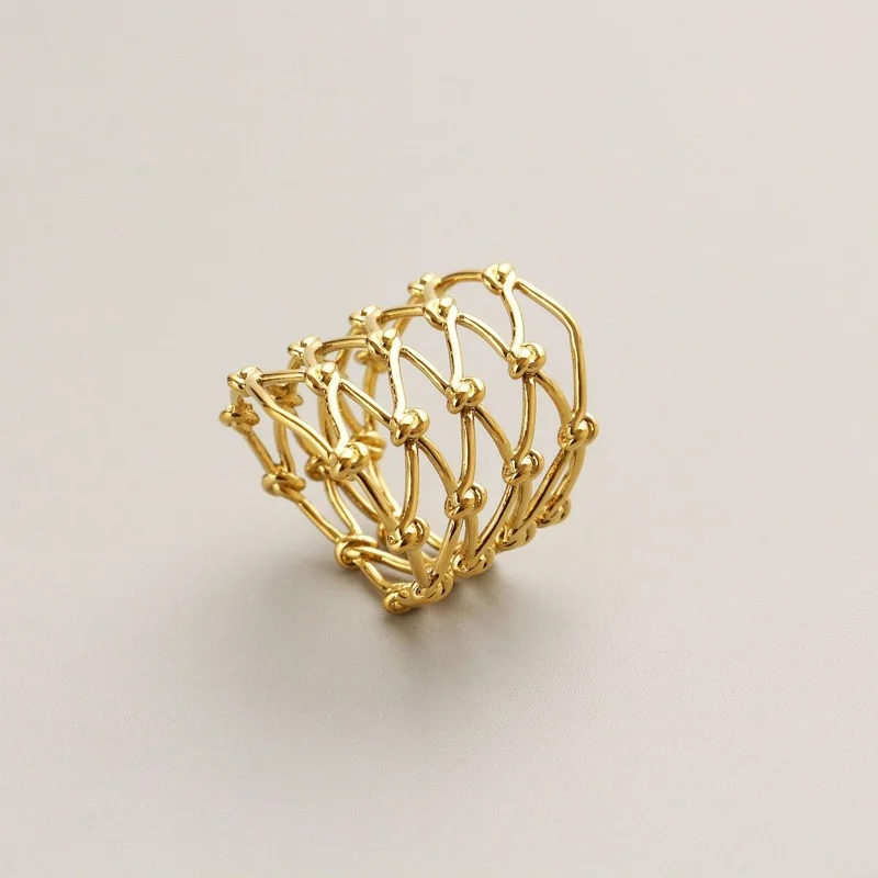 

European and American Simple Temperament Hollow Weaving Knotted Wide Face Ring Color Preservation Plating
