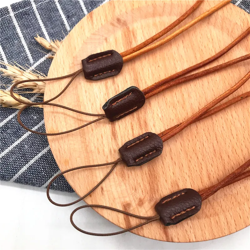 Натуральная кожа Ремешок наручные веревка для Мобильный телефон значок usb-ключи