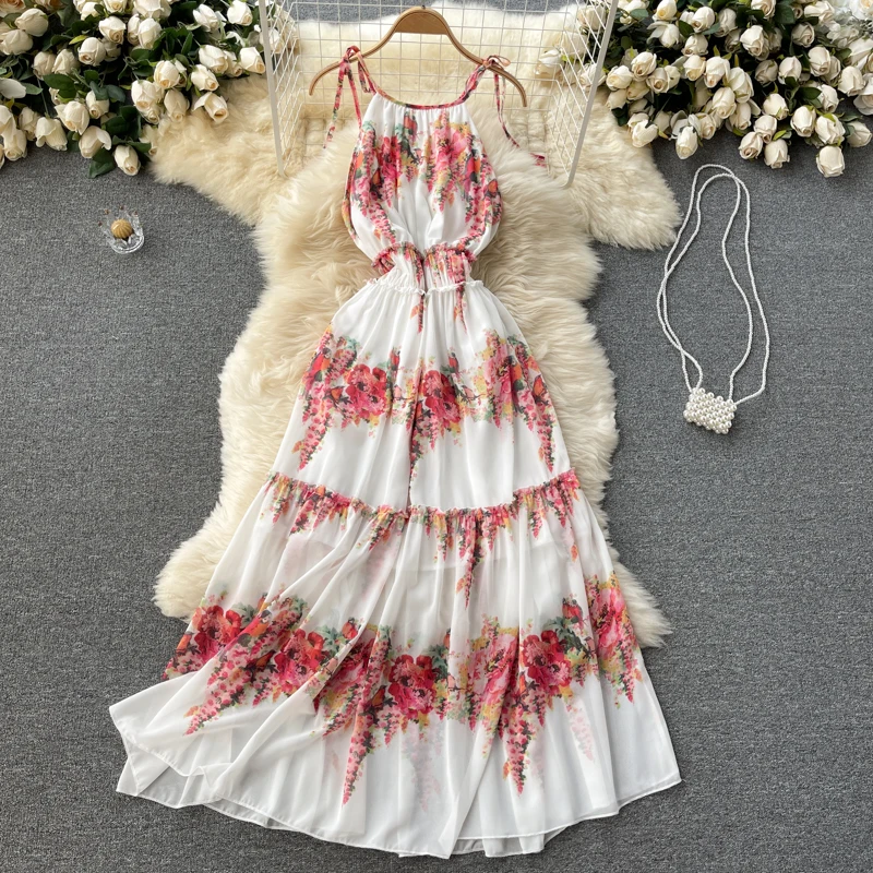 

Ladies dress noble and elegant temperament women's 2021 new heavy industry printing scheming hanging neck strap holiday skirt