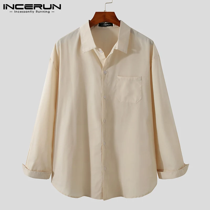 

Рубашка мужская однотонная с отложным воротником и длинными рукавами