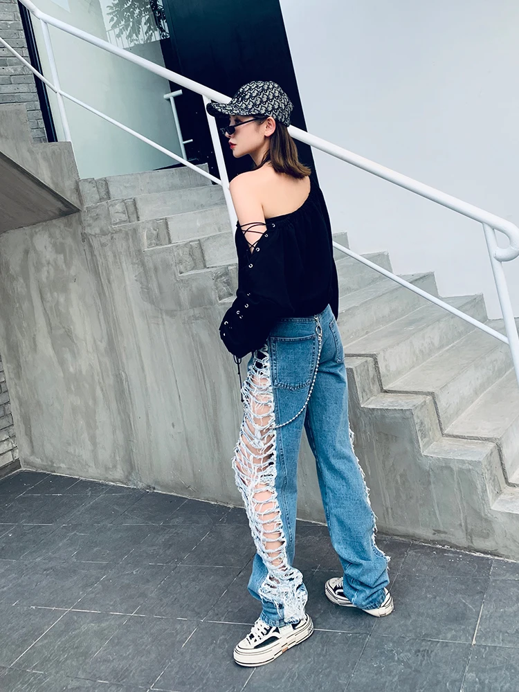 Модные брендовые женские джинсы с боковыми дырками на весну 2020 свободные