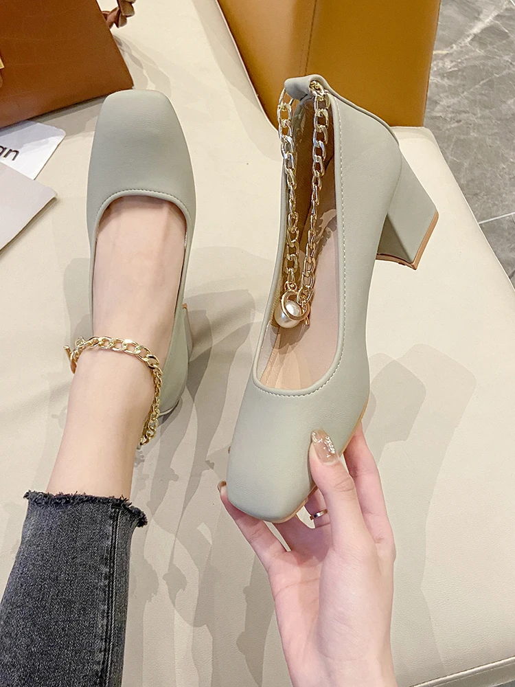 

Retro trend metal decoration square head shallow mouth single shoes summer new style ladies high heels elegant and fashionable.