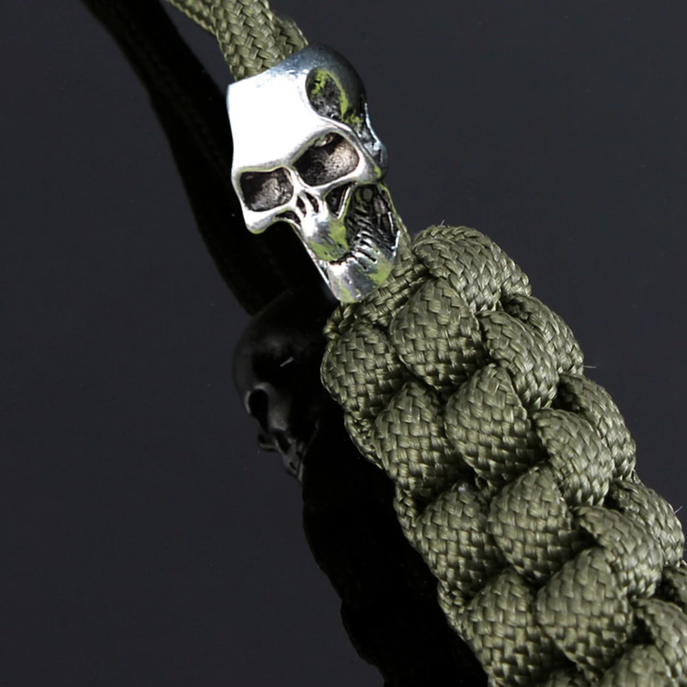 

10pcs Portable Alloy Outdoor Skull Shape Flashlight Accessories Hiking Durable Camping Multipurpose Tool Pendant