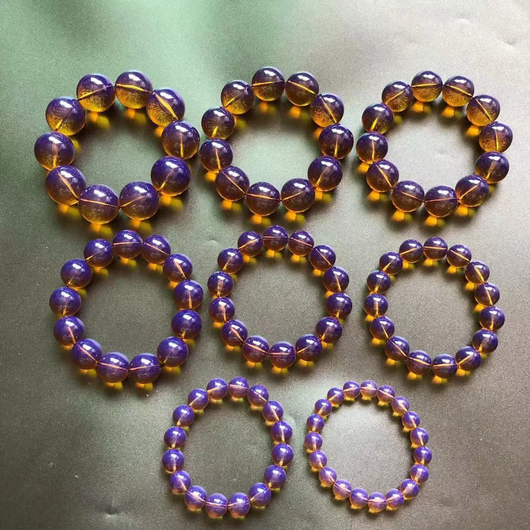 

Imitation Dominica fluorescent floating black background natural light color violet round bead bracelet single Circle Bracelet
