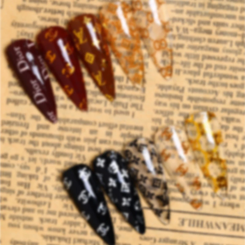 

10 Rolls/Box Nail Foils Transfer Paper Stickers Luxury Brand Logo Nails Art Watermark Decals UV Gel Design Decoration