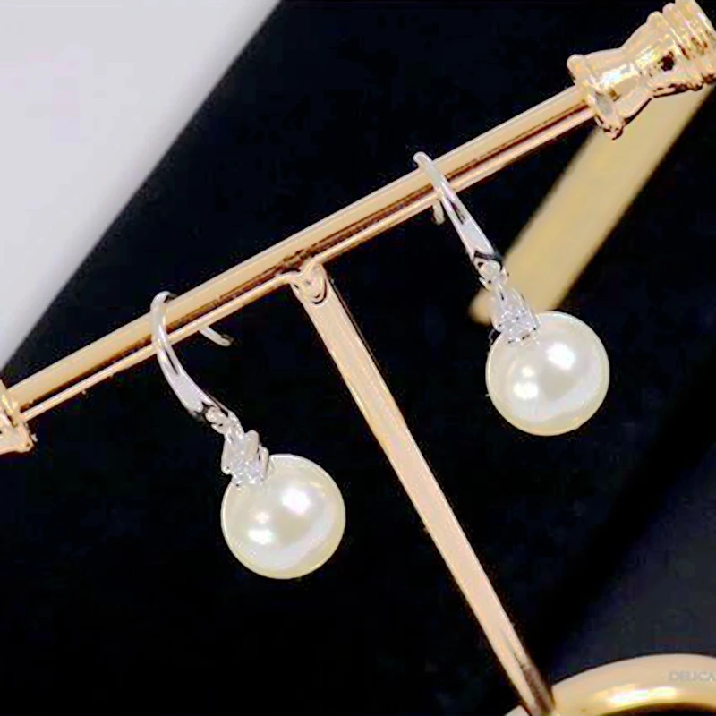 

Korean version of the temperament female new elegant zircon pearl diamond earrings Baita sweet tassel long ear jewelry
