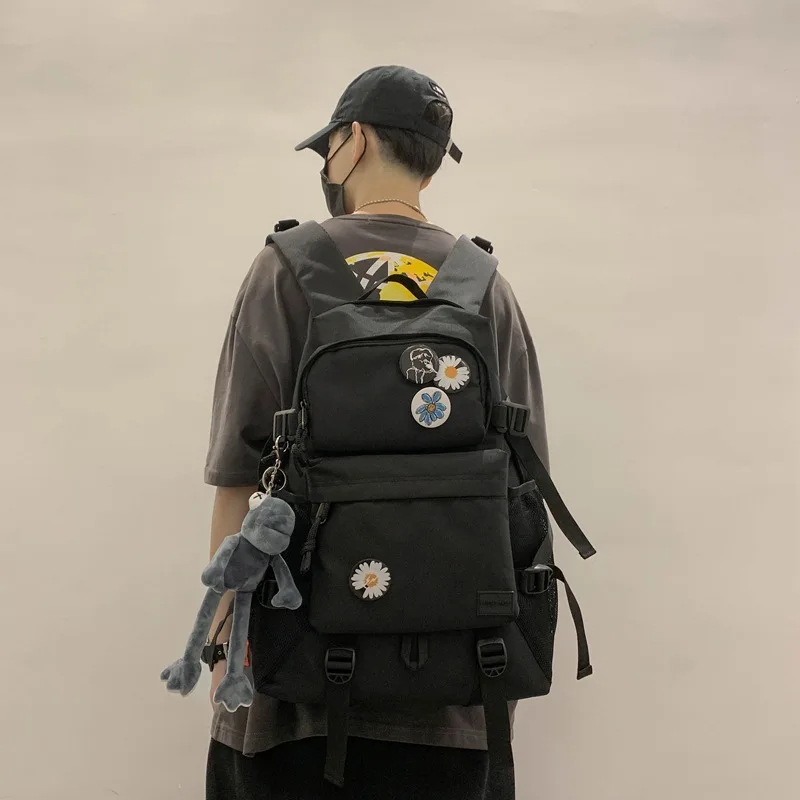 

Schoolbag Korean Harajuku high school students backpack large Oxford cloth backpack men's trend.