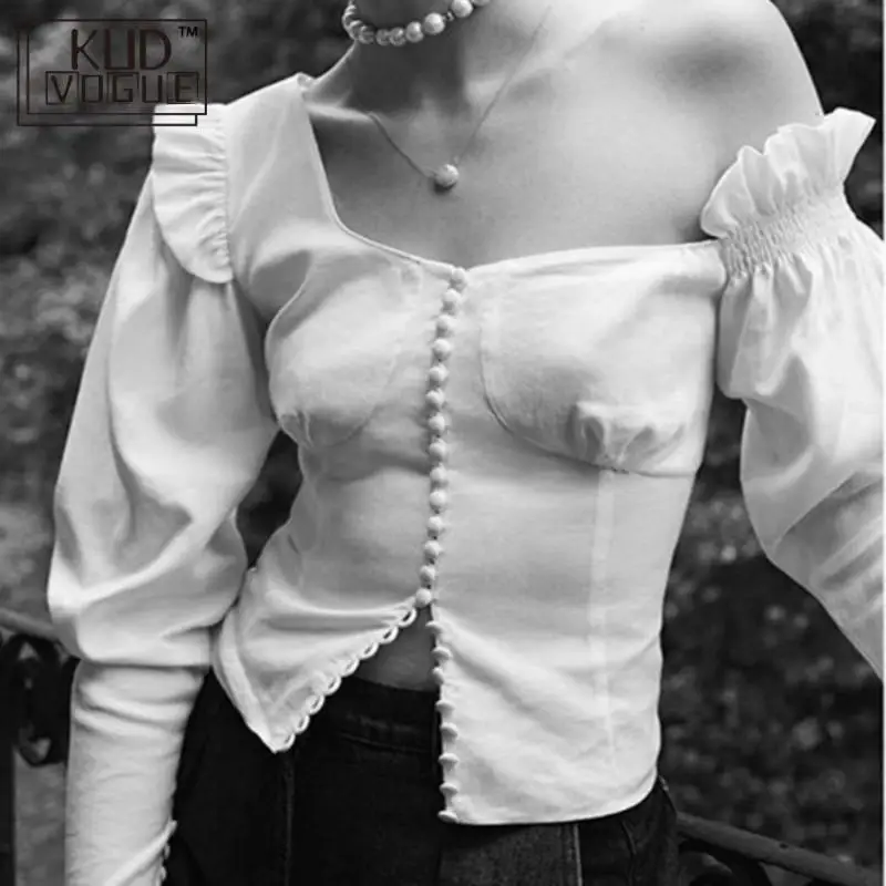 Женская ассиметричная блузка белая с рукавом фонариком и оборками на