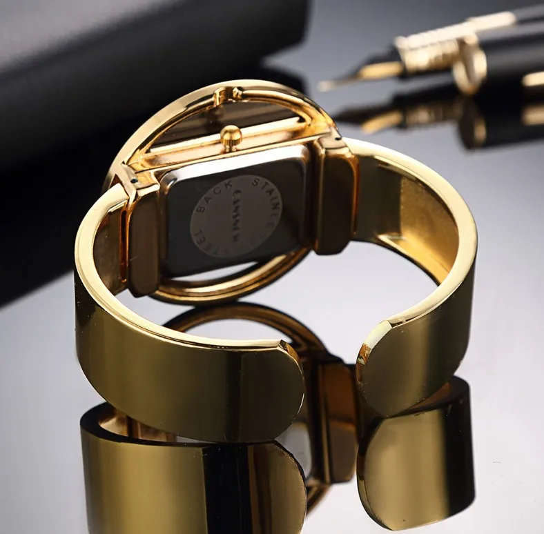 

The new luxury brand creative hollow bracelet watch all-match ladies quartz watch all-match dress gold watch ladies