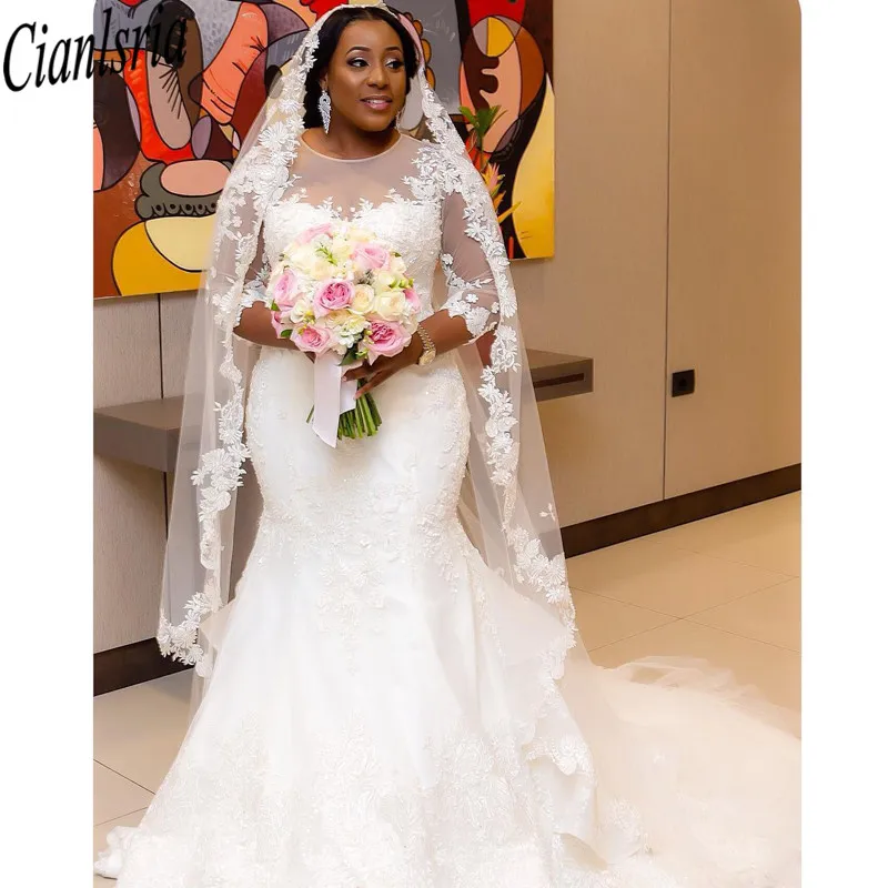 

2020 Plus size Mermaid Wedding Dress Illusion Long Sleeves Lace Jewel Sheer Neck Court Train Country Stylish Wedding Dress