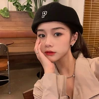 designer model autumn and winter warm wool knitted beret female japanese net red p label tide brand anti wear forward hat