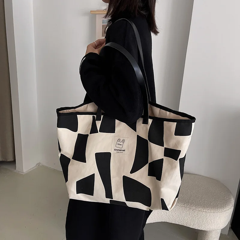 

Female bag new style 2021 fashion Korean tote bag large capacity commuter canvas bag simple texture shoulder bag W32
