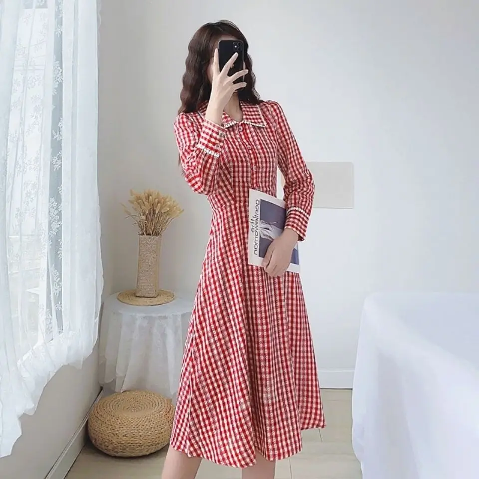 

Spring and autumn dress 2021 new Plaid high waist slim temperament long sleeve retro shirt baby collar mid long skirt