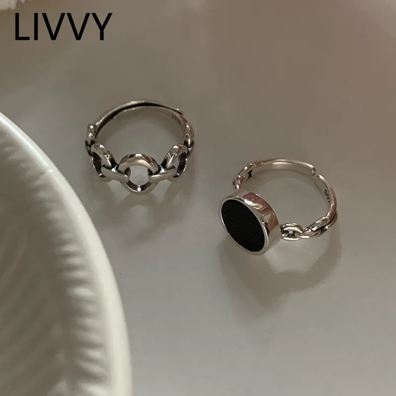Кольцо женское ажурное с черной эмалью серебристого цвета |