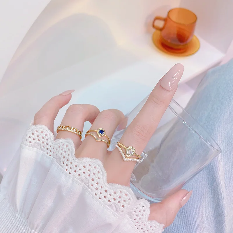 

New design French retro design blue zircon temperament pearl double temperament lace hollow fairy ring open rings for women