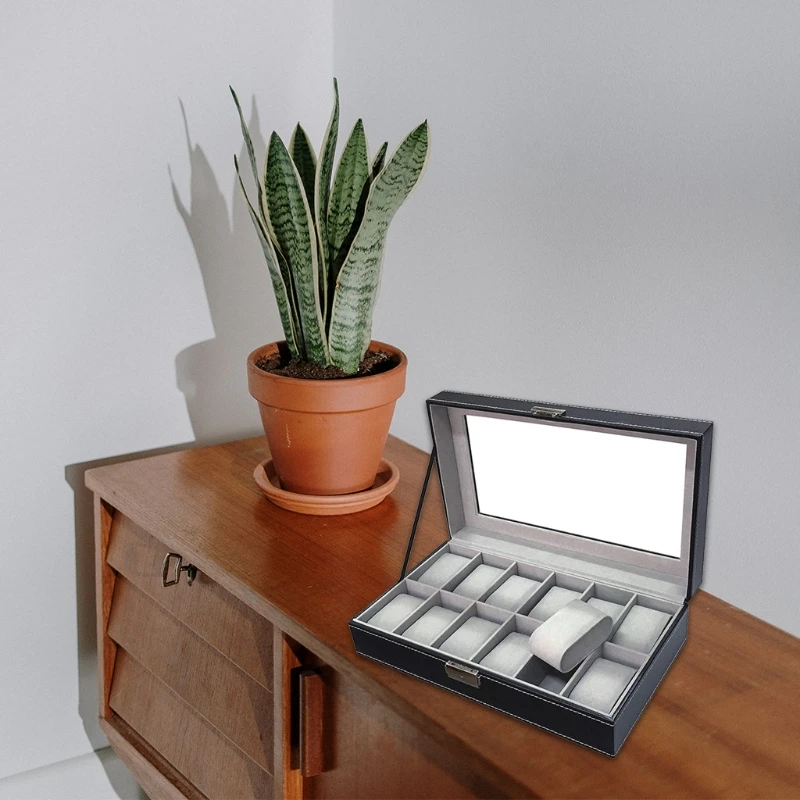 

100% brand new and high quality Features: wood construction, 12 mens Watch Display Box. Black PU Leather, Fully lined in a grey