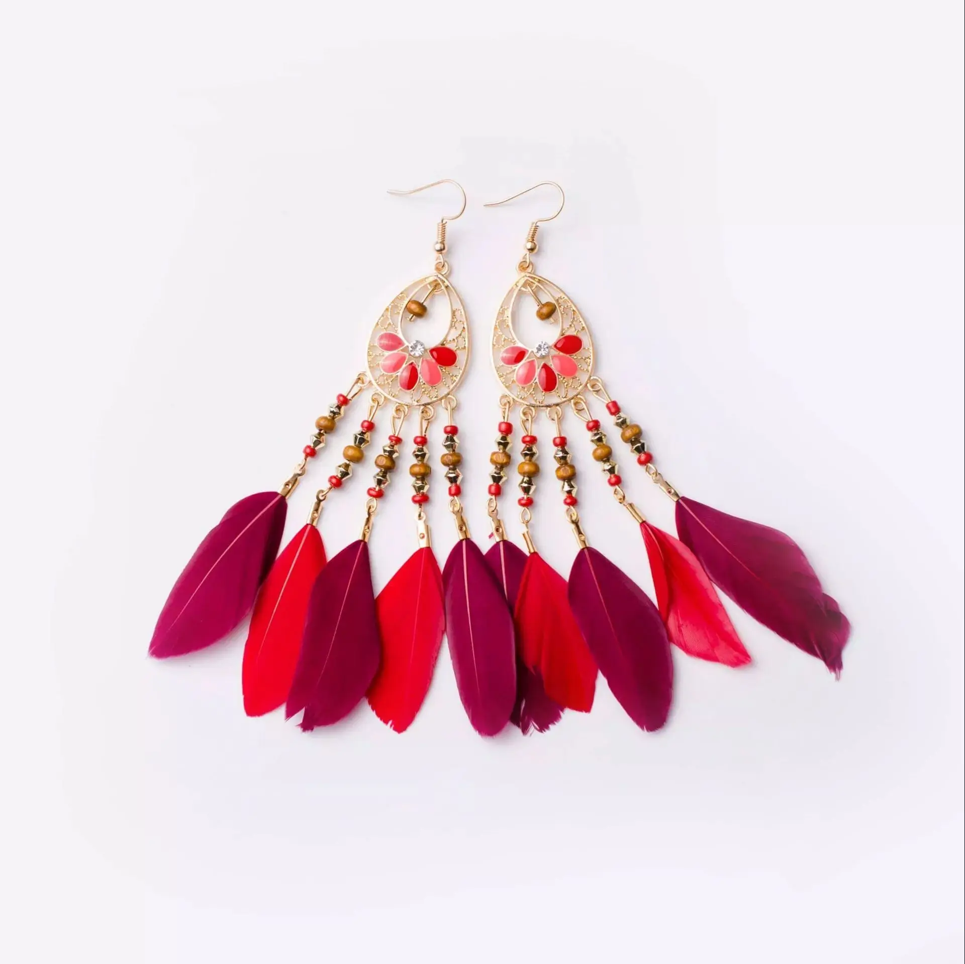 

Color rice beads retro tassel earrings Bohemian ethnic style feather earrings female European and American jewelry hundred